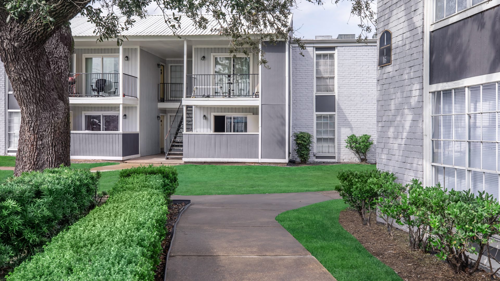 a house with a tree in front of it